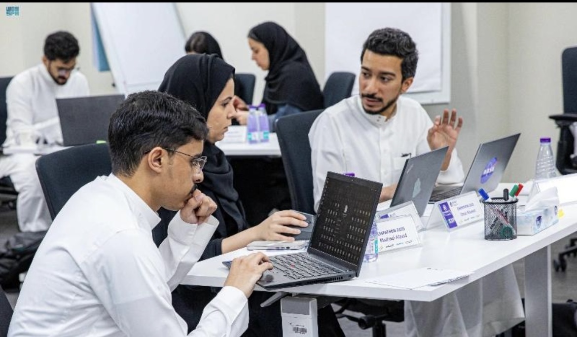 Saudi participants working together in a professional collaborative session